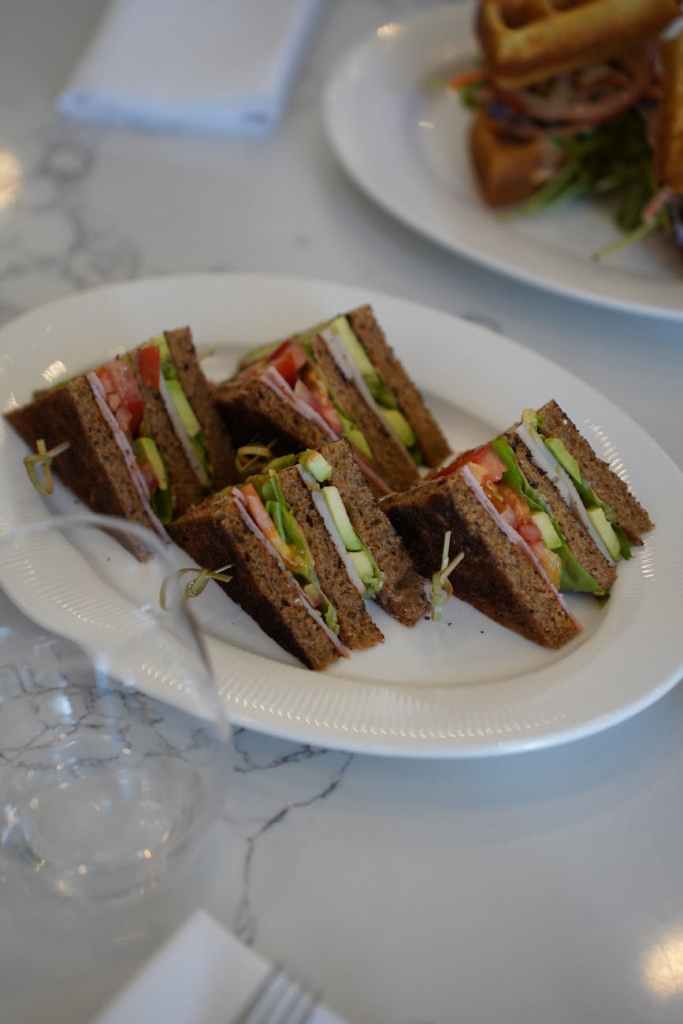 delicious club sandwich on elegant plate